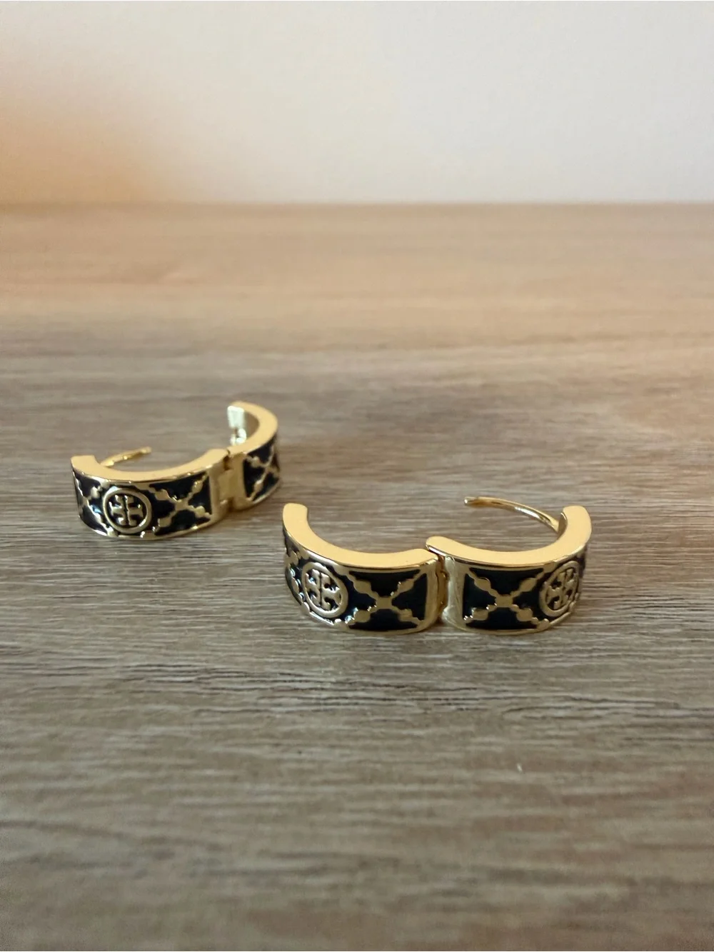 Tory Burch Kira Black Enamel Logo Huggie Hoop Earrings Gold Tone